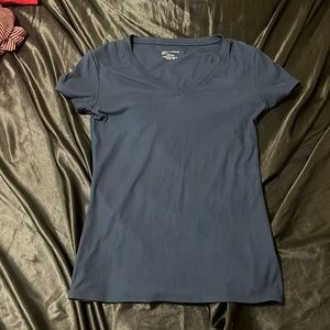 Navy blue fitted shirt.